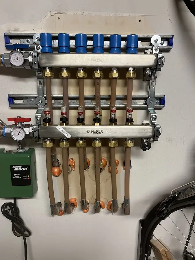 Plumber performing Water Heater Repair at a residential property in Sikeston